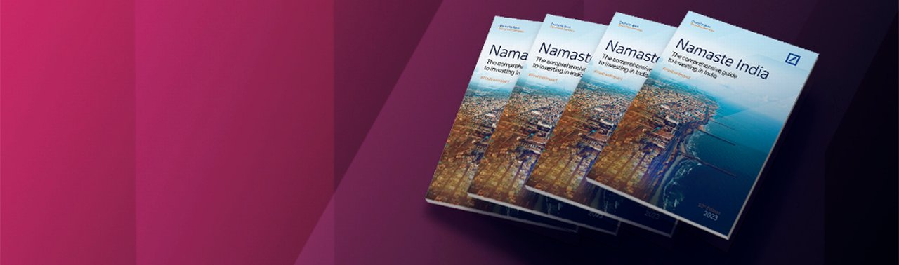 Several Namaste India magazines on an abstract magenta background