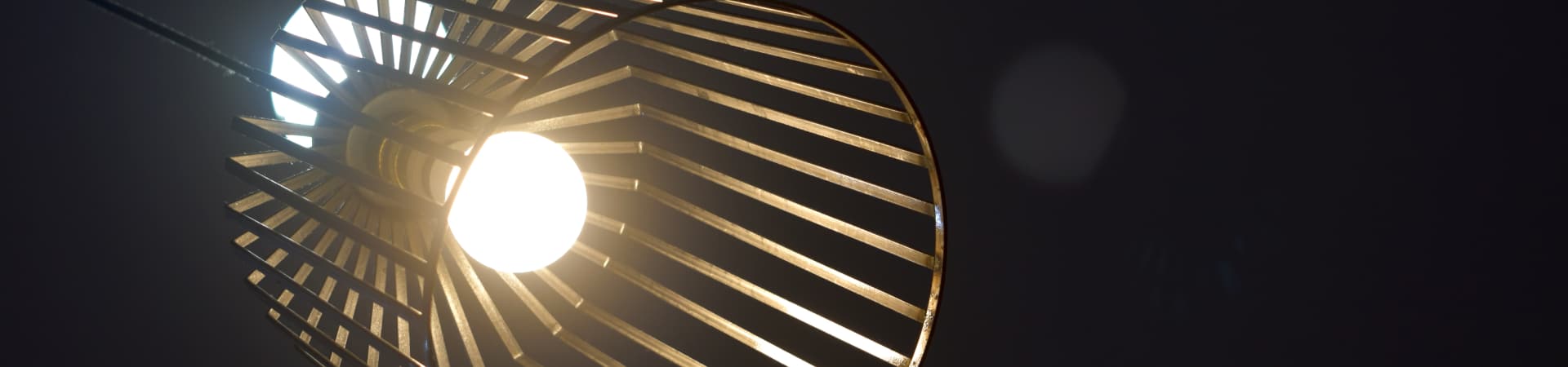 Light Lamp Hanging From Celling With Black Background